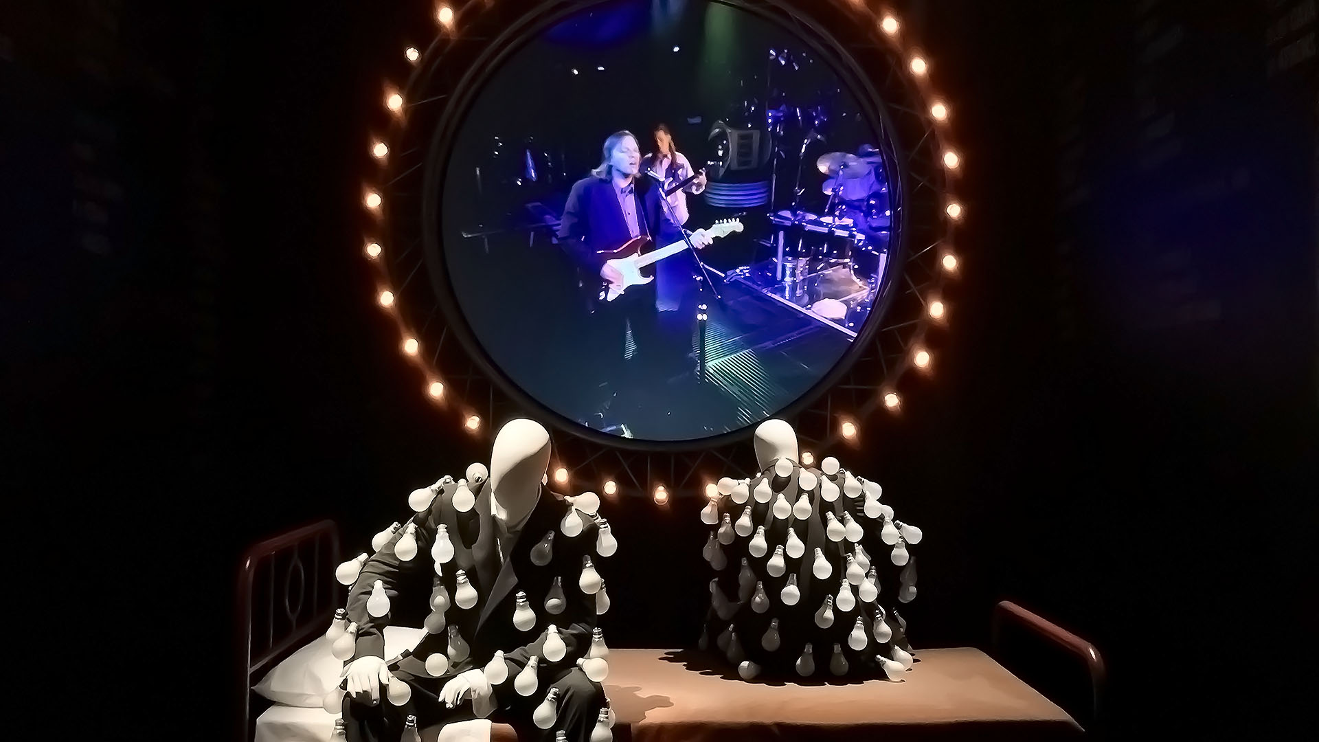 Pink Floyd Exhibition Mannequins Light Bulbs Bed Circular Image
