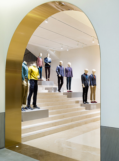 Architectural Lighting Solution Brass Arch Mannequins Monolithic Stone Staircase Luxury Fashion Nulty