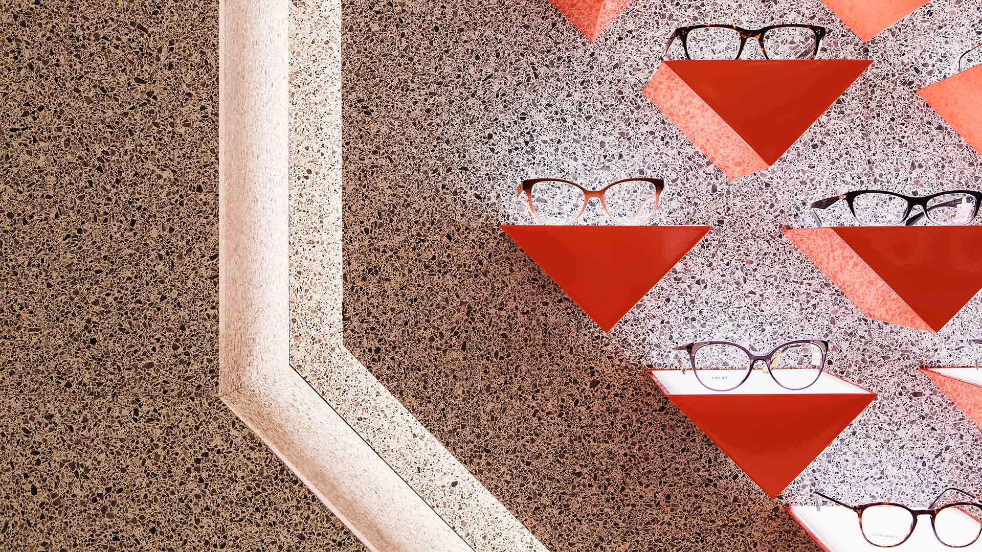 Integrated Lighting Stylish Wall Retail Display Red Triangular Details Opticians Nulty