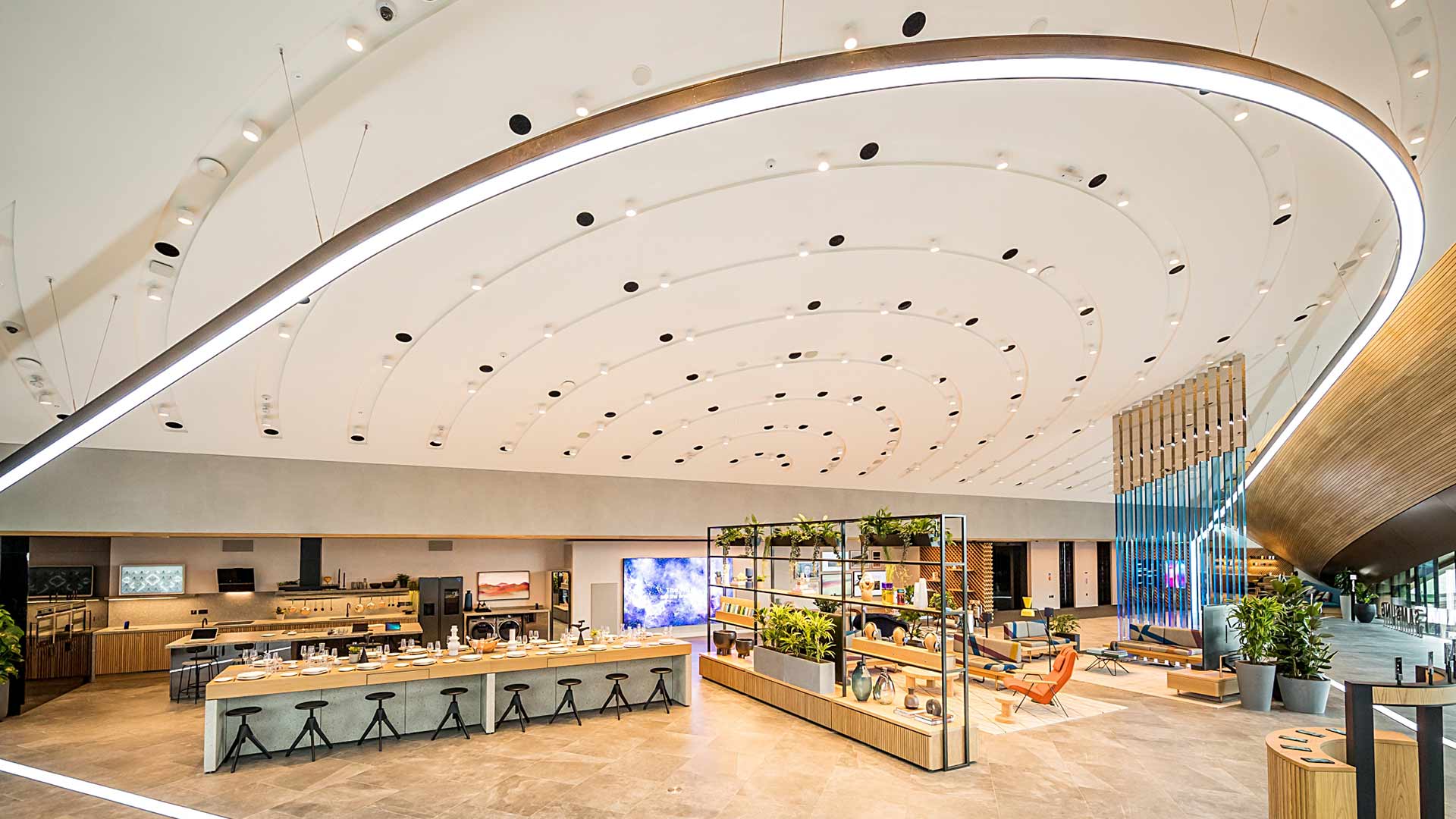 Retail Lighting Design Sweeping White Roof Swoop Light Installation Samsung KX London Consultants Nulty