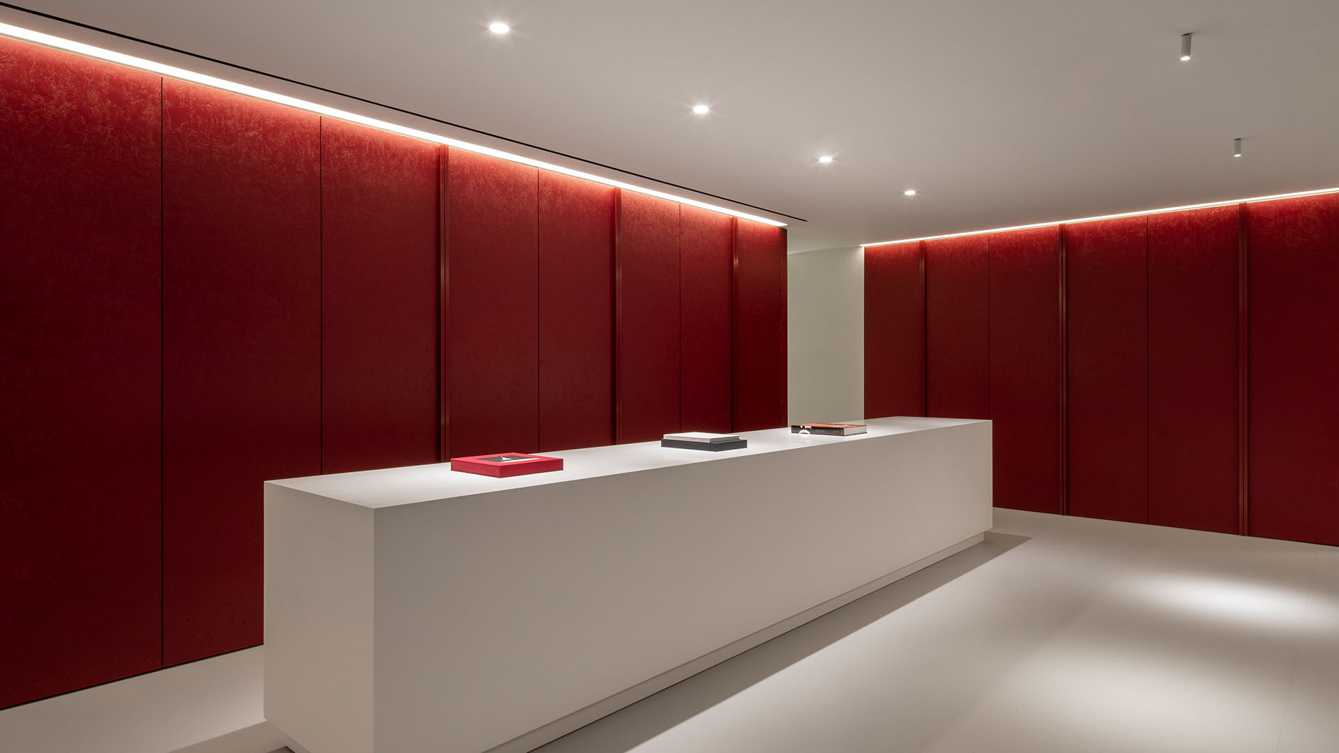 Architectural Lighting Design Low Energy Sleek Contemporary Office Red Feature Walls Merchandise Sample Table Consultants Nulty