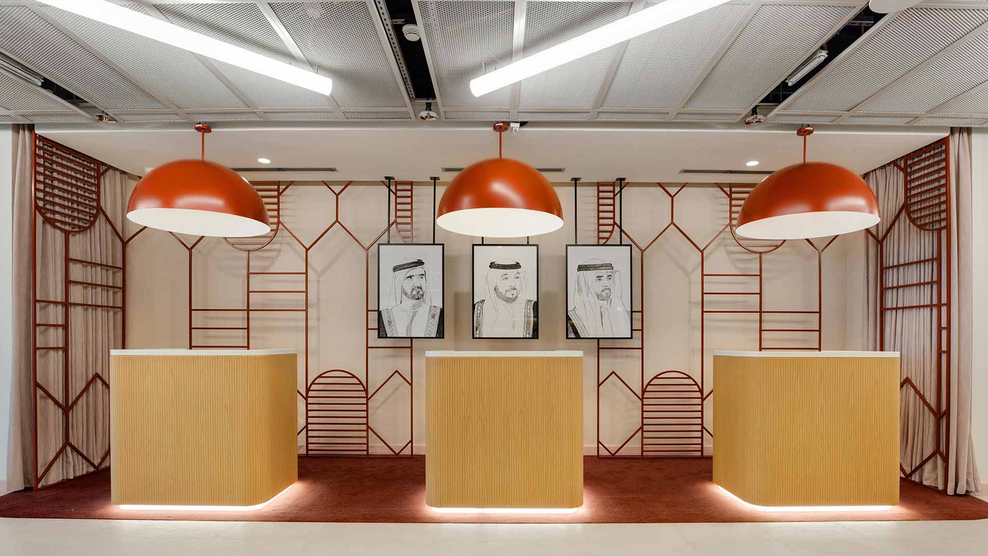 Lighting Design Hotel Reception Modern Trendy Interior Illuminated Reception Desks Oversized Orange Pendants Linear Ceiling Lights Dubai Nulty