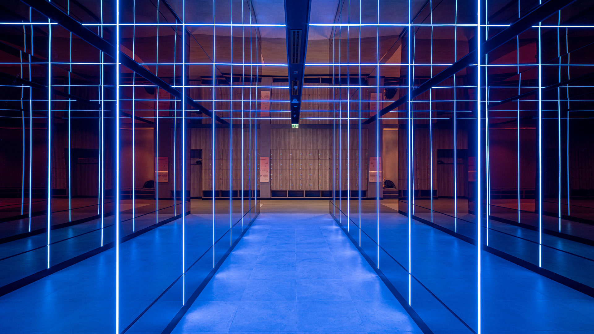 FitnGlam Gym Womens Supergym Blue Neon Light Tunnel Architectural Lighting Design Consultants Nulty Dubai